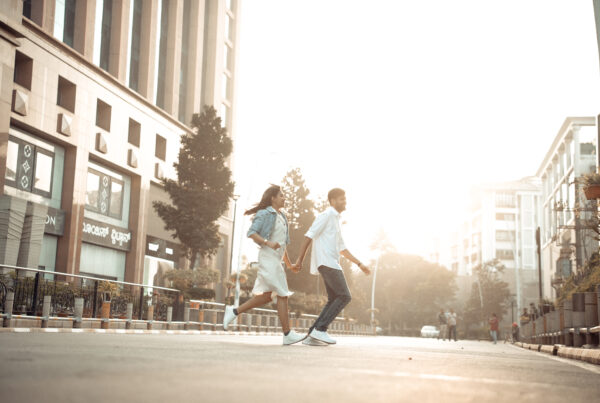 Prewedding photoshoot couple crossing road in MG Road bangalore